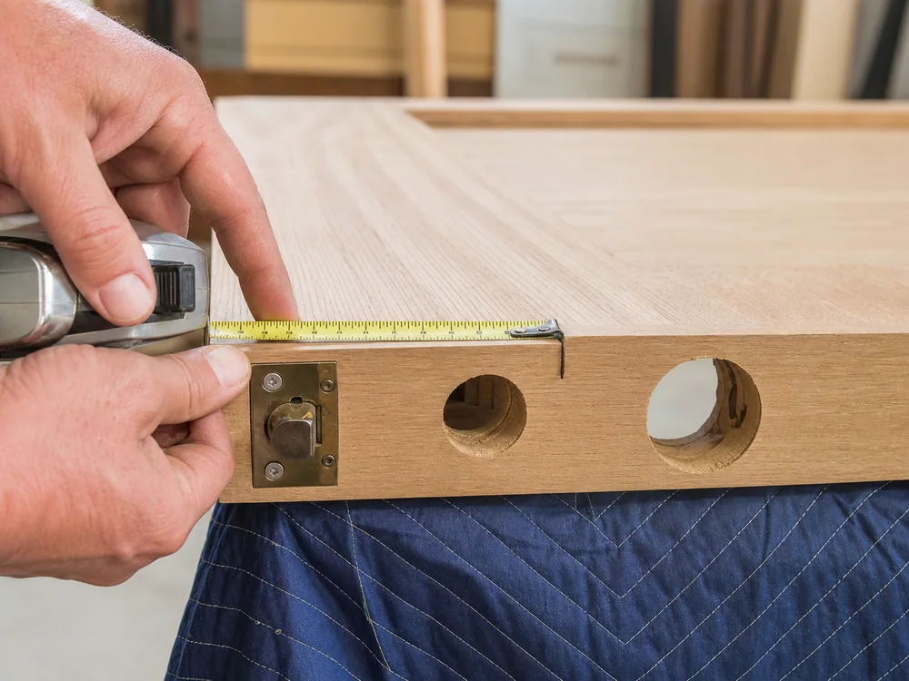 Measure the backset from the door edge to the centre of the lock bore.